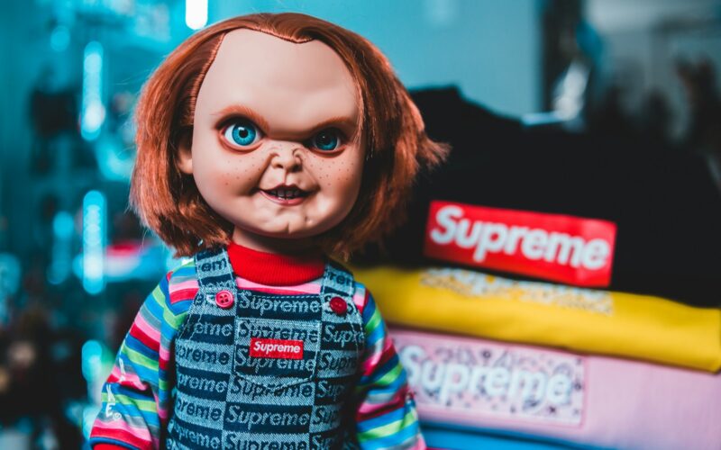 girl in blue white and red striped long sleeve shirt