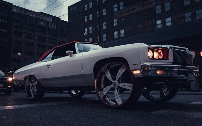white car parked near building during daytime